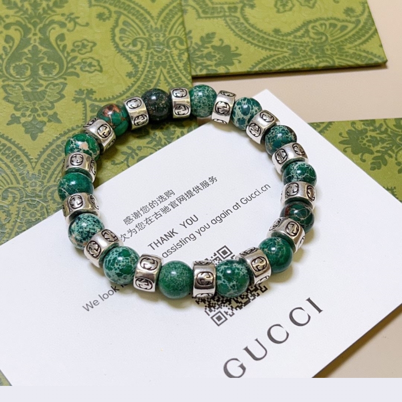 G*u*i bracelets